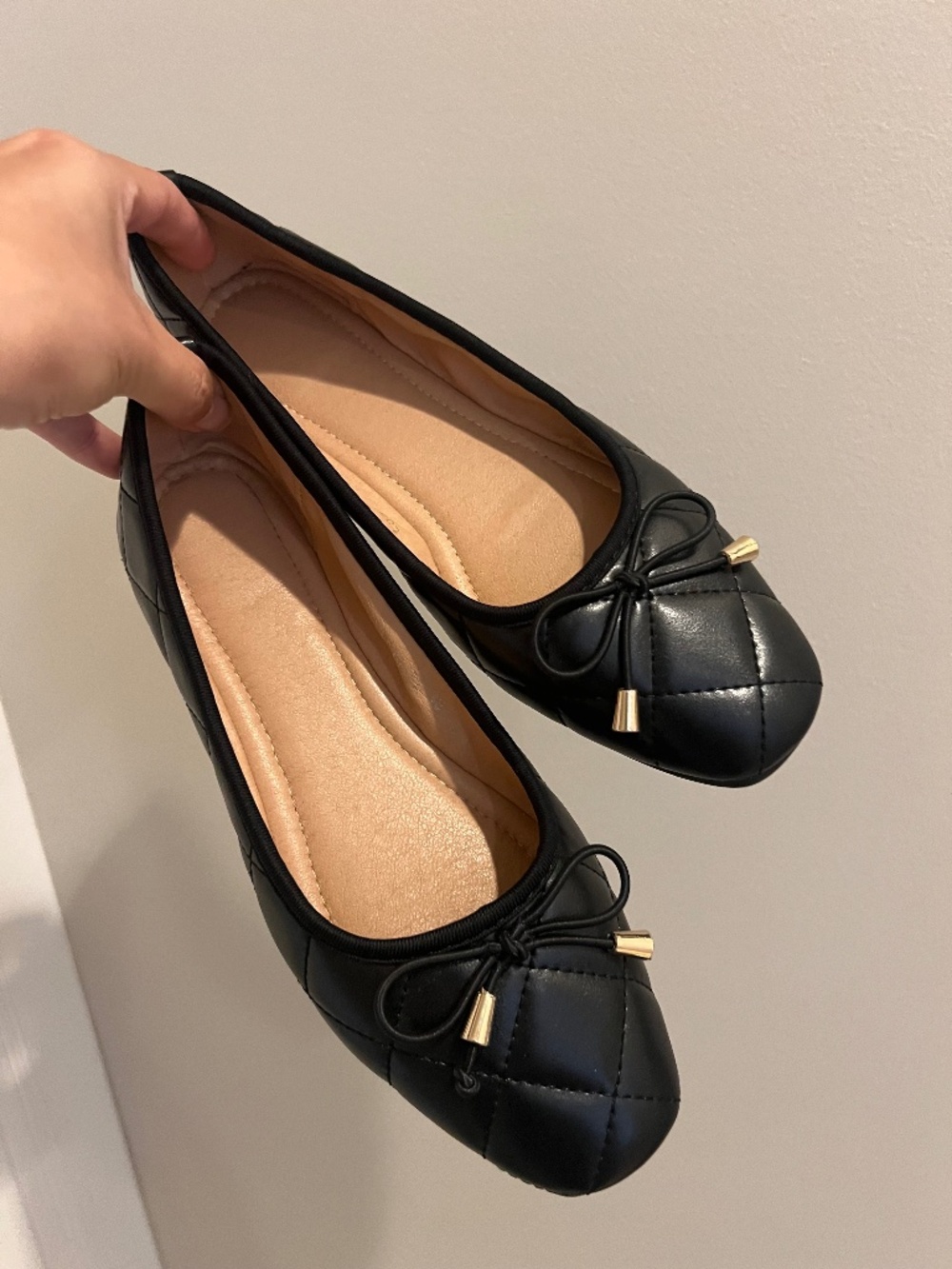 Black quilted ballet flats in EU size 38